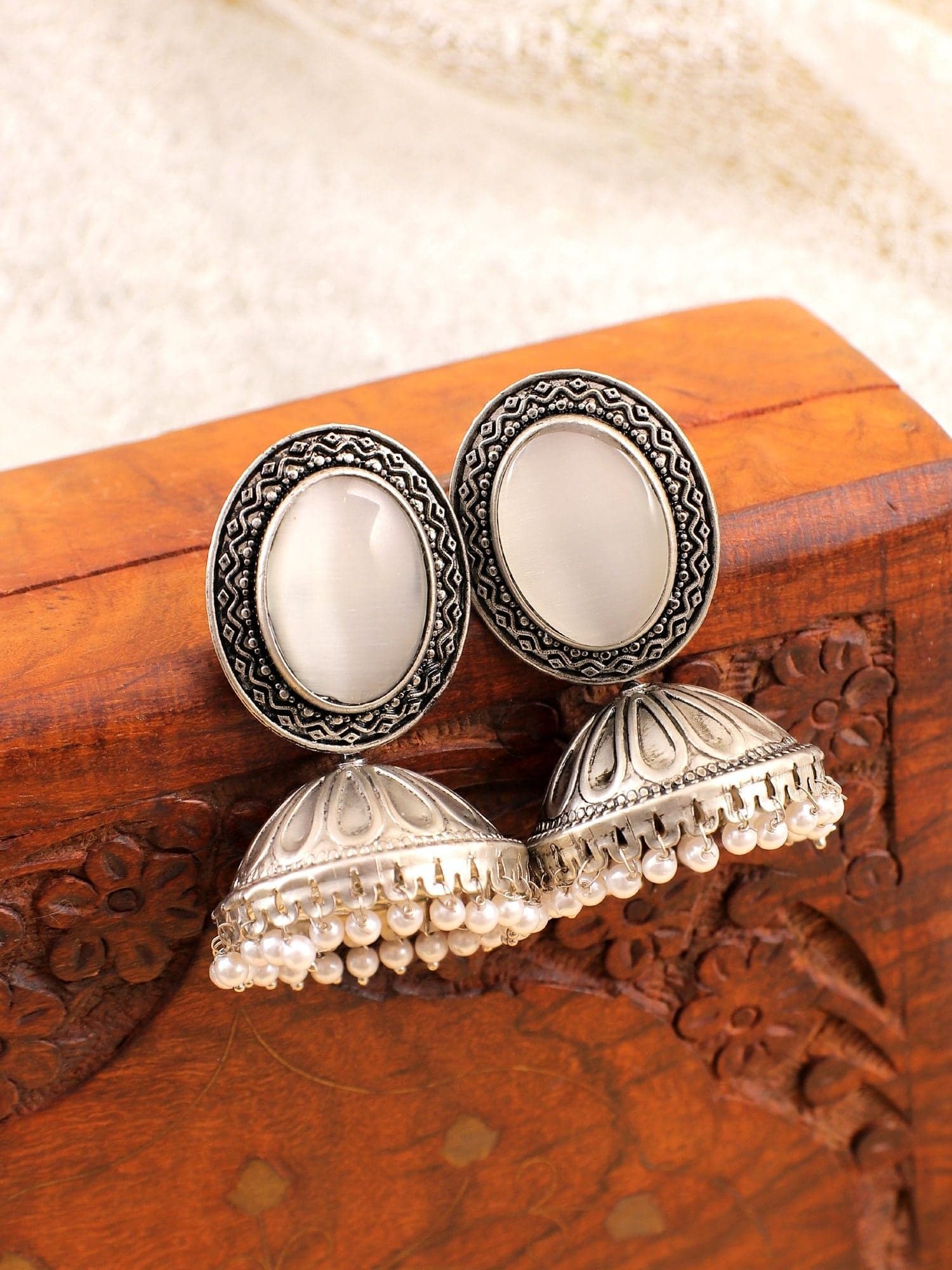 Chic Oxidised Silver Jhumkas with White Crystal Beads for Fashionistas