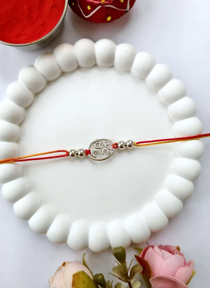 Handcrafted Silver Om Rakhi - Unique Brotherly Token 2026