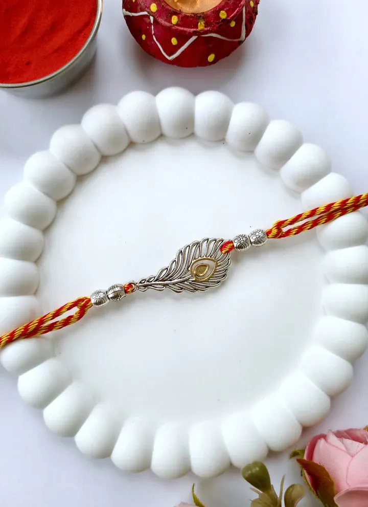 Premium 2026 Handmade Oxidised Silver Rakhi with Peacock Feather Design