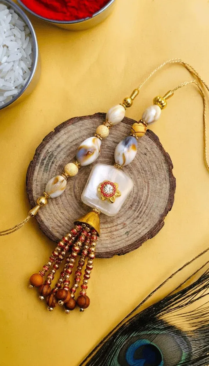 Gold Alloy Crystal Beauty - Handmade Kundan Rakhi for Online Purchase
